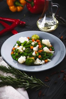 Delicious mix of vegetables on the plate. View from above