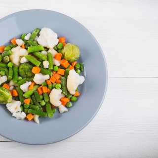Delicious mix of vegetables on the plate. View from above