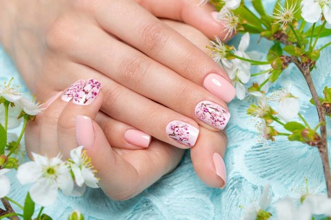 Spring manicure for the bride in gentle tones with flowers. Nail Design