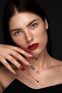 Portrait of a beautiful woman with classic make up in glamorous style