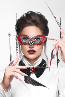 Portrait of a beautiful woman with art make-up in glamorous style