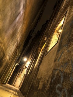 Narrow alley with lantern in Venice