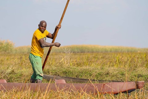 Fishermen on canoe