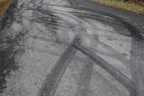 Tire prints on a country road