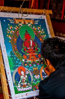 Painter drawing a Thanka