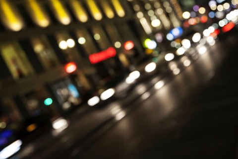 Blurred headlights in evening rush hour traffic