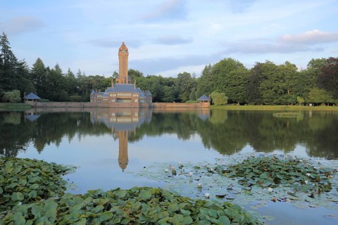 Jachthuis Sint Hubertus built 1915 on the lake with pond roses