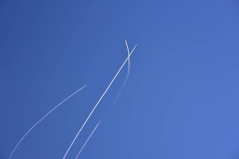 Condensation streaks from military jets during flight manoeuvres over Bavaria