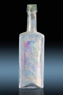 Decomposed glass often appears laminated