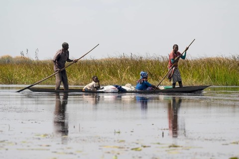 Local family in canoe