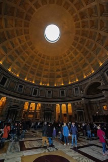 Free-standing coffered ceiling with oculus Ocukus in historic Roman temple Christian church Roman Pantheon