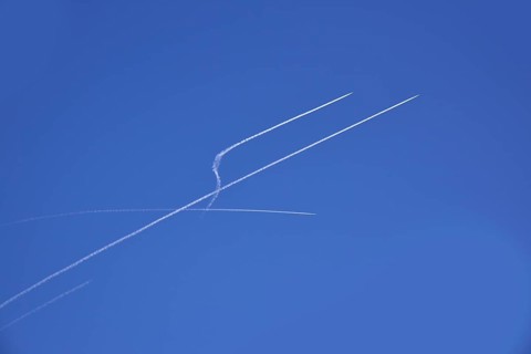 Condensation streaks from military jets during flight manoeuvres over Bavaria