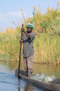 Fisherman on his canoe