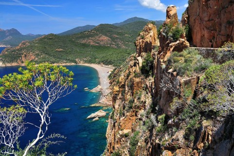 The coastal road through the Calanche de Piana overlooking the beach of Bussaglia