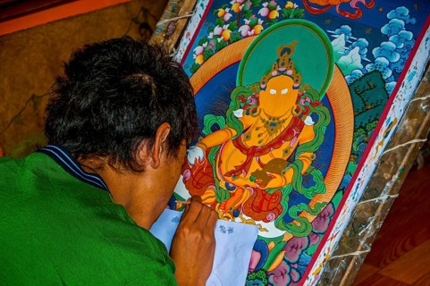 Painter drawing a Thanka