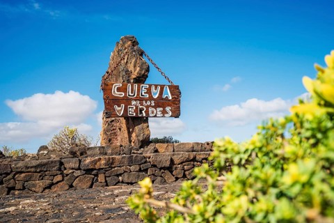 Cueva de los Verdes sign informing about stunning Verdes Cave