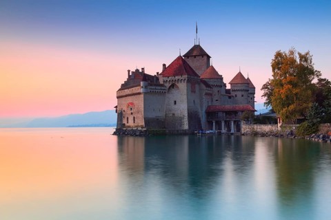 Chillon Castle at dusk on Lake Geneva in the canton of Vaud