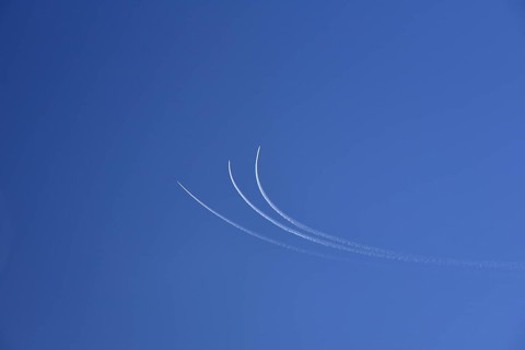 Condensation streaks from military jets during flight manoeuvres over Bavaria