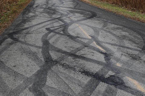 Tire prints on a country road