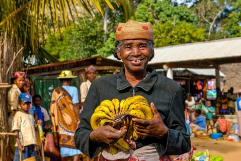 Woman presenting her bananas