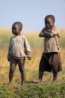 Children look on laughing