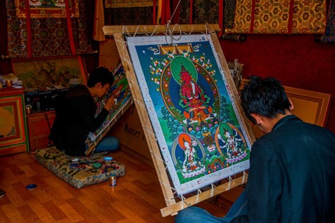 Painter drawing a Thanka