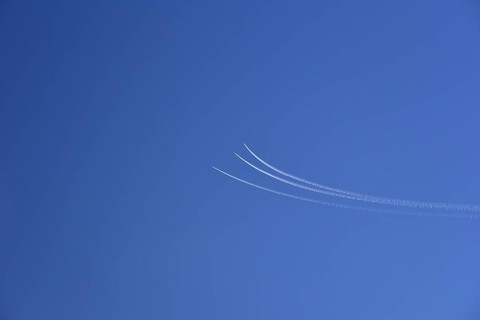 Condensation streaks from military jets during flight manoeuvres over Bavaria