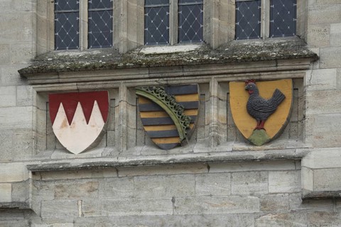 Three coats of arms