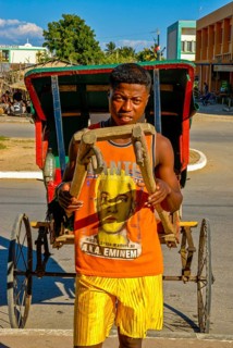 Man running with his walking rickshaw