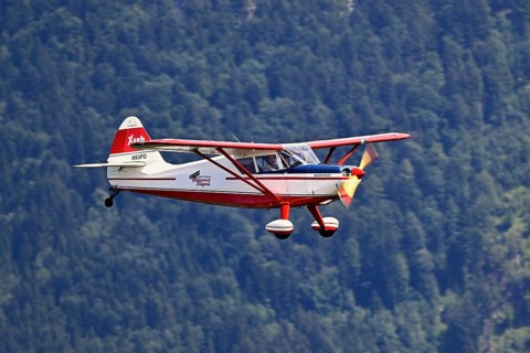 Vintage aircraft Stinson Voyager 108-2 in flight