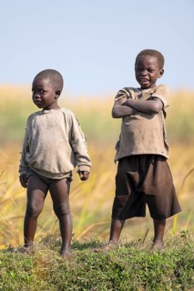 Children look on laughing