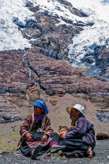 Pilgrims taking a break on the Karo-La Pass along the Friendship Highway