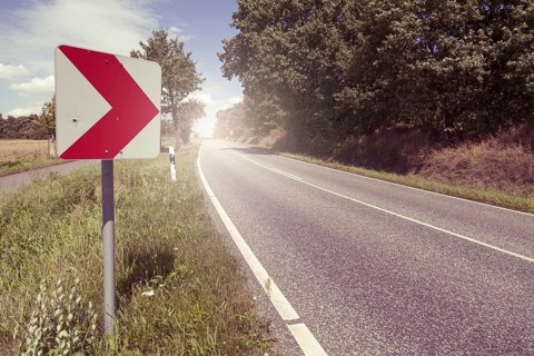Road with sign Curve