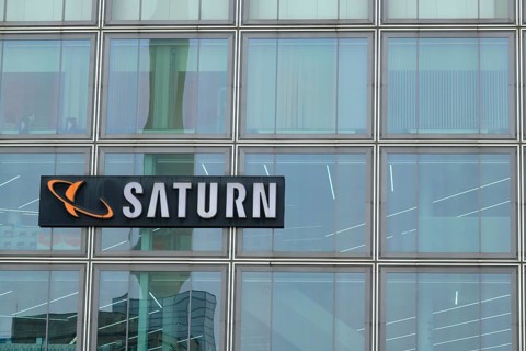 Glass facade with Saturn logo