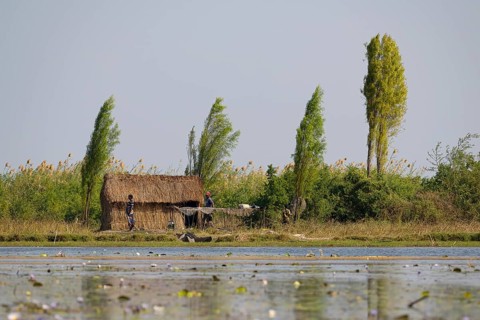 Local family with their hut