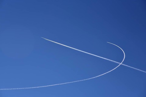 Condensation streaks from military jets during flight manoeuvres over Bavaria