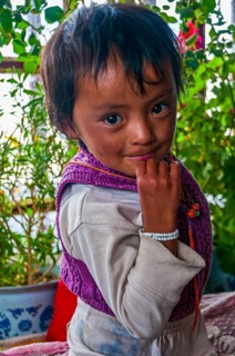Young tibetan child in a guest house along the Kailash Kora