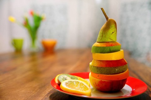 Slices of different fruits layered on top of each other
