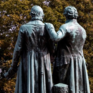 Rear view of double statue Goethe-Schiller monument by Ernst Rietschel