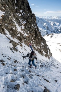 Ski tourers on the ascent in a saddle