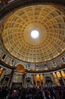 Free-standing coffered ceiling with oculus Ocukus in historic Roman temple Christian church Roman Pantheon