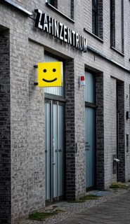 Smiley advertising at a dental centre in the Europacity