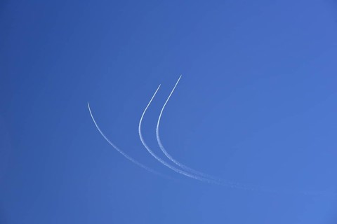 Condensation streaks from military jets during flight manoeuvres over Bavaria