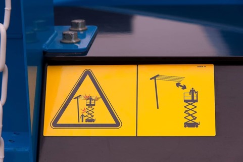 Warning signs on construction machinery
