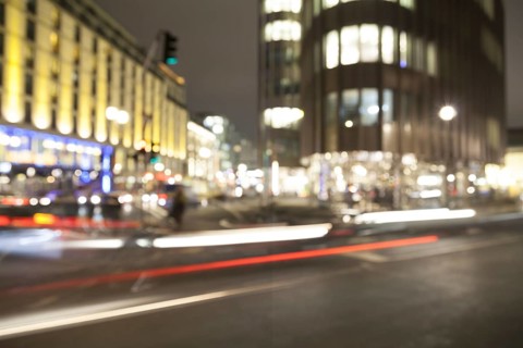 Blurred headlights in evening rush hour traffic