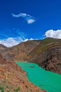 Turquoise lake on the Karo-La Pass along the Friendship Highway