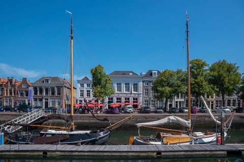 Historic ships in the museum harbour at the Old Harbour