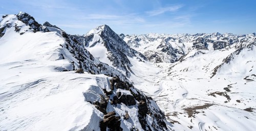 Mountain panorama of the Stubai Alps in winter with Schrankarkogel peak