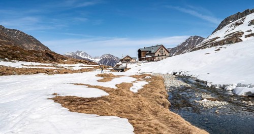 Oberbergbach and Franz-Senn-Huette mountain hut in winter