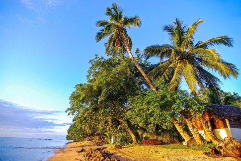 Bungalows at sunrise on the island Ile Sainte Marie